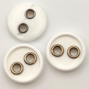 Bouton blanc trou doré 18mm