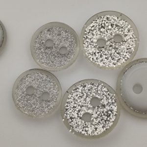 Bouton blanc pailletté