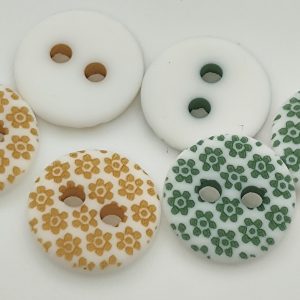 Bouton motif petite fleur 12mm